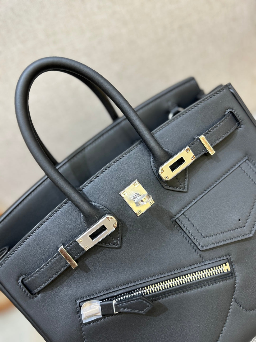 Birkin 25 Rock Black Leather Multi-Pocket Handbag with Chain
