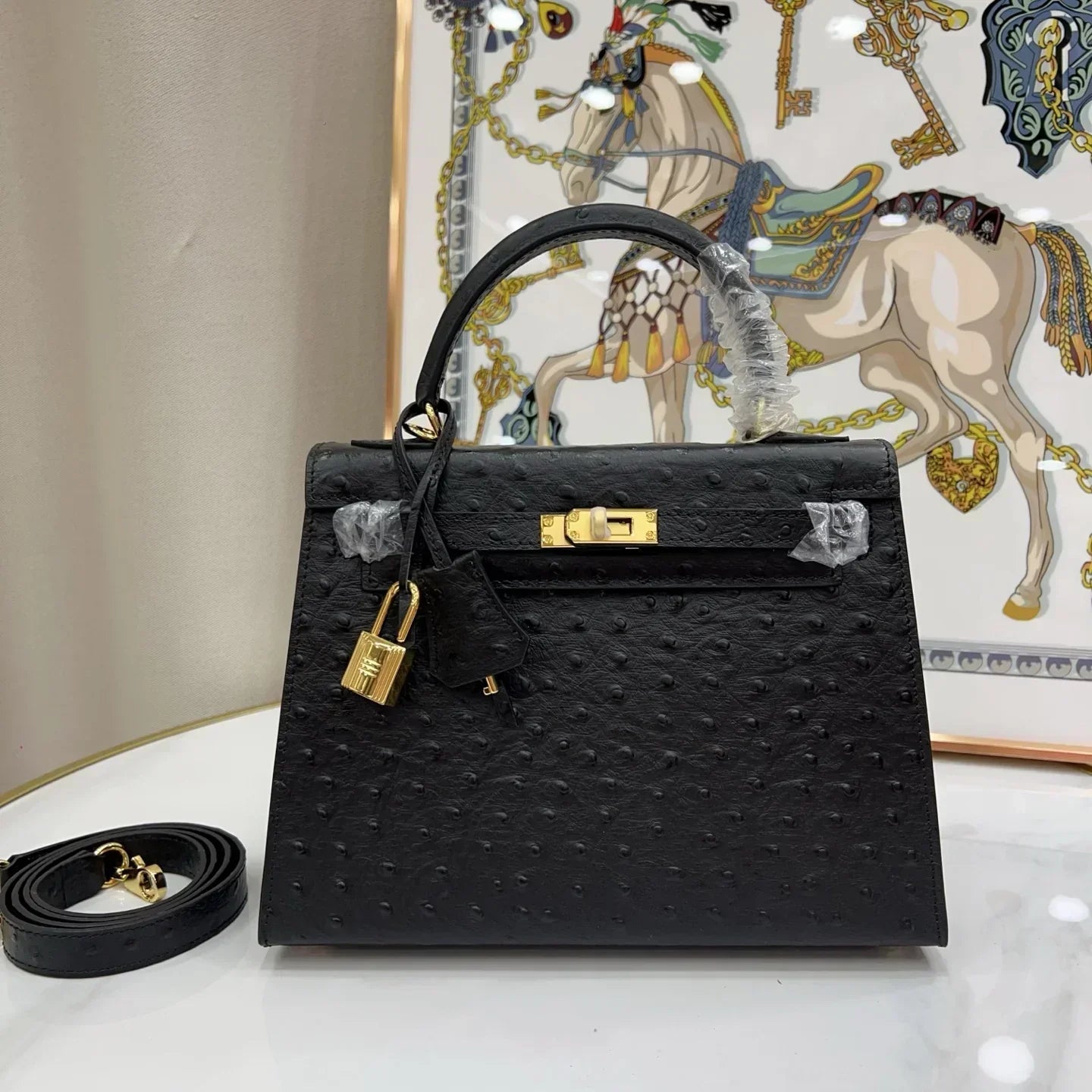 Kelly 25 Sellier Black Ostrich Gold Hardware
